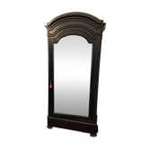 Black wardrobe with a mirrored door in ebony finish.