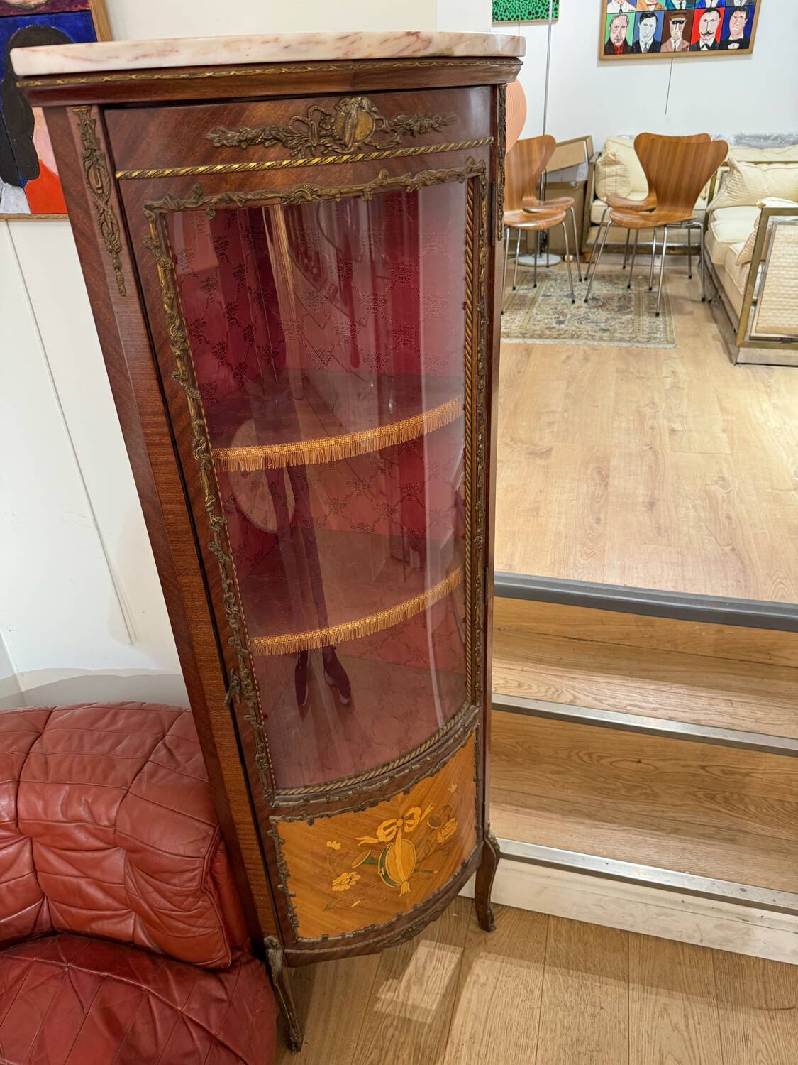 Corner display case in wood veneer with musical instrument marquetry