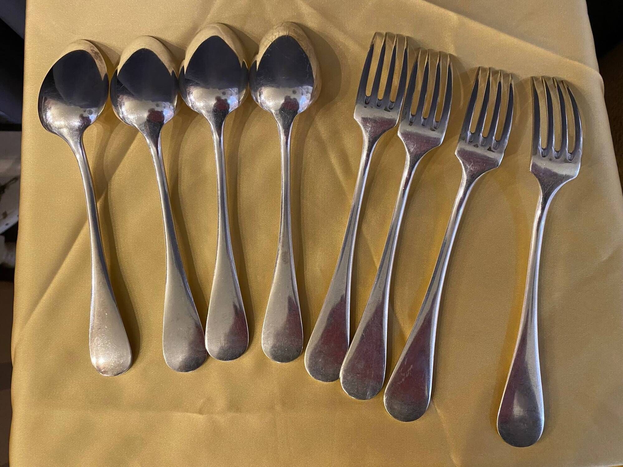 Series of 4 silver metal cutlery uniplat net model spoons forks