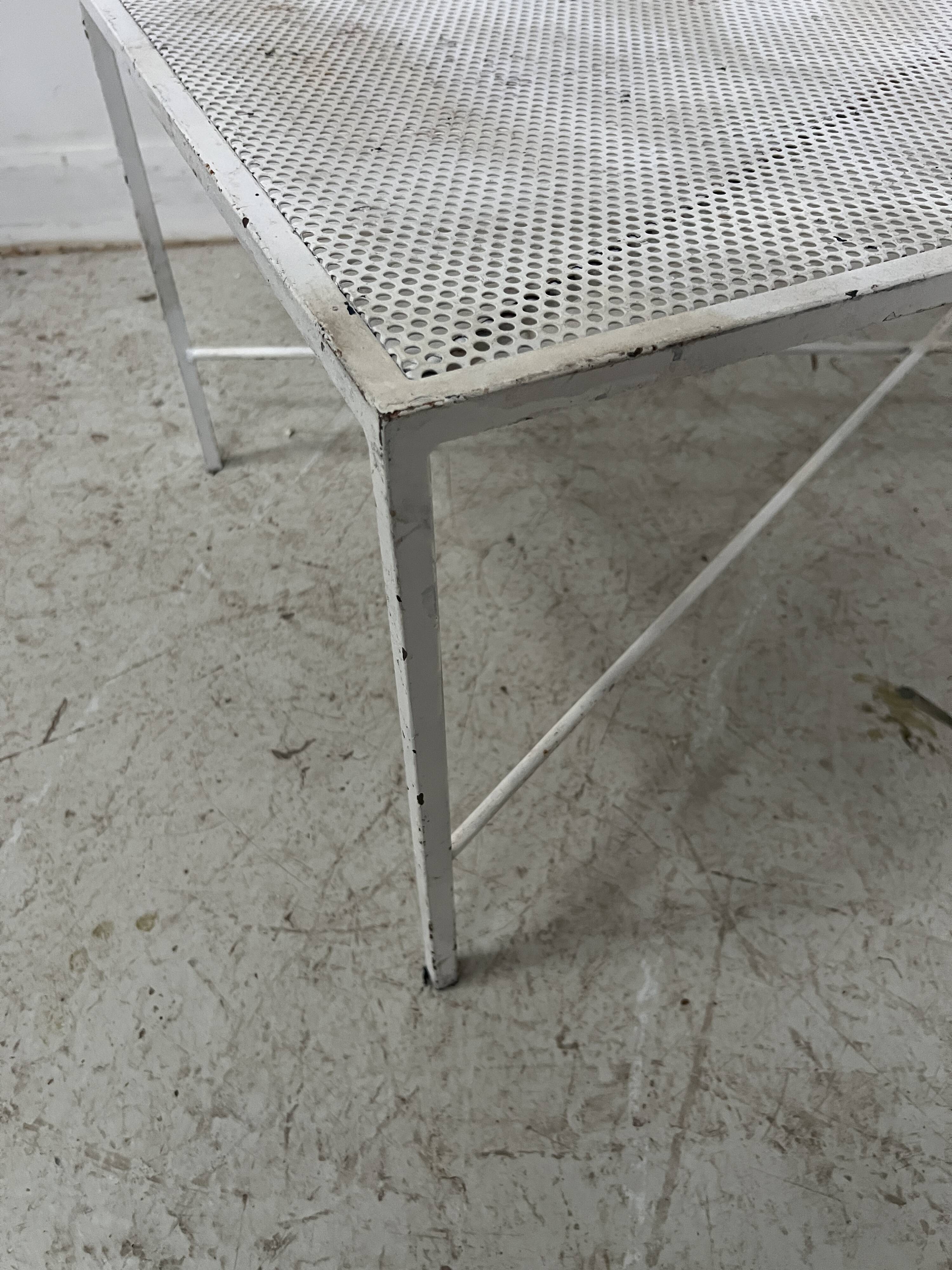 Painted wrought iron coffee table, 20th century.