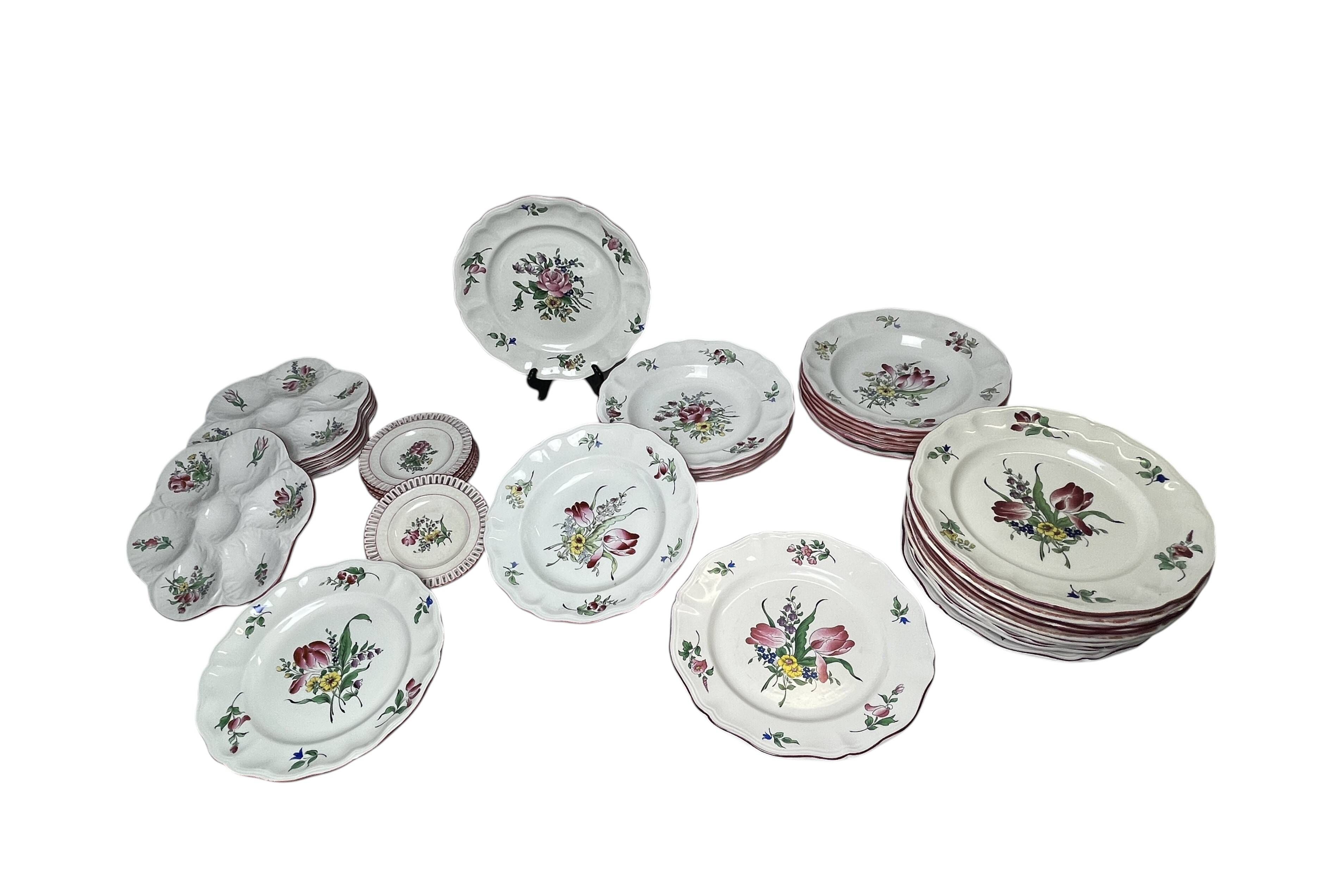 42-piece Lunéville KG tableware set with floral decoration, 20th century