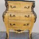 Commode galbée style Louis XV en marqueterie en loupe d'orme et bronze