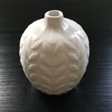 White vase with ear of corn decor