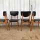 Set of 4 Scandinavian teak and black skai chairs