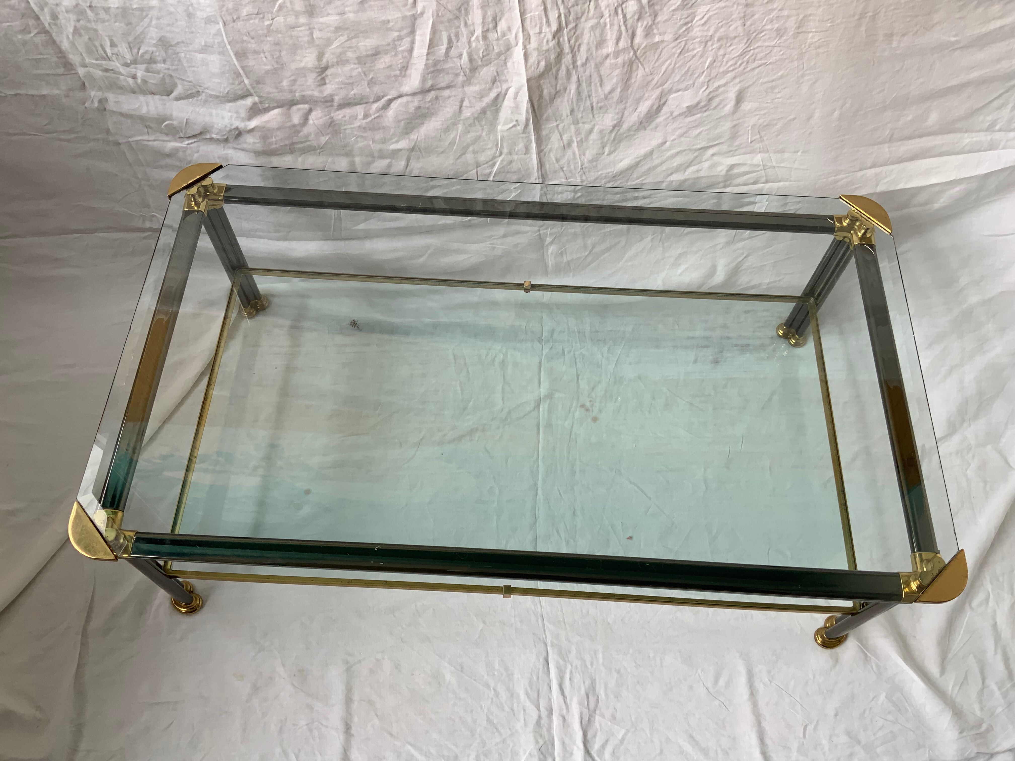 Glass and brass coffee table