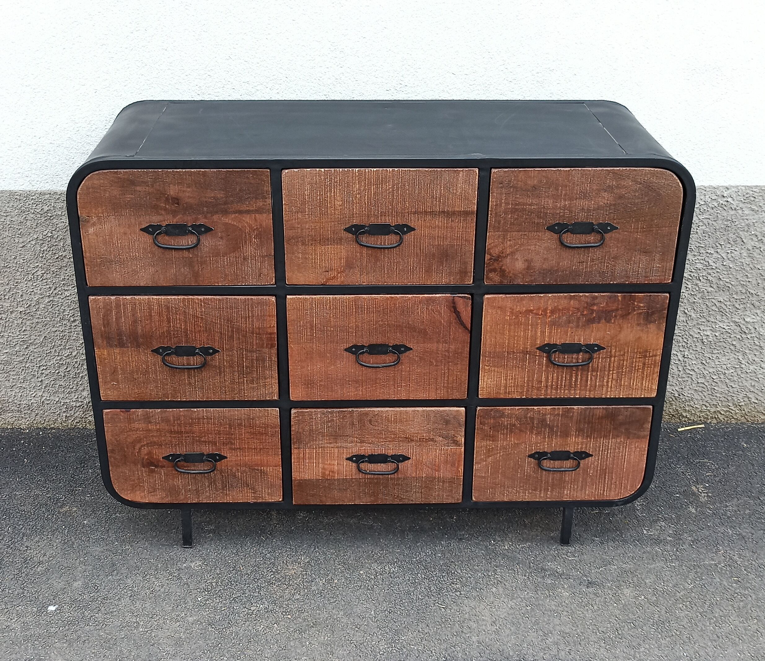 Black metal sideboard with wooden drawers