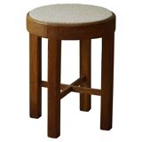 Mid-century Danish stool in oak, reupholstered in boucle wool, circa 1950.