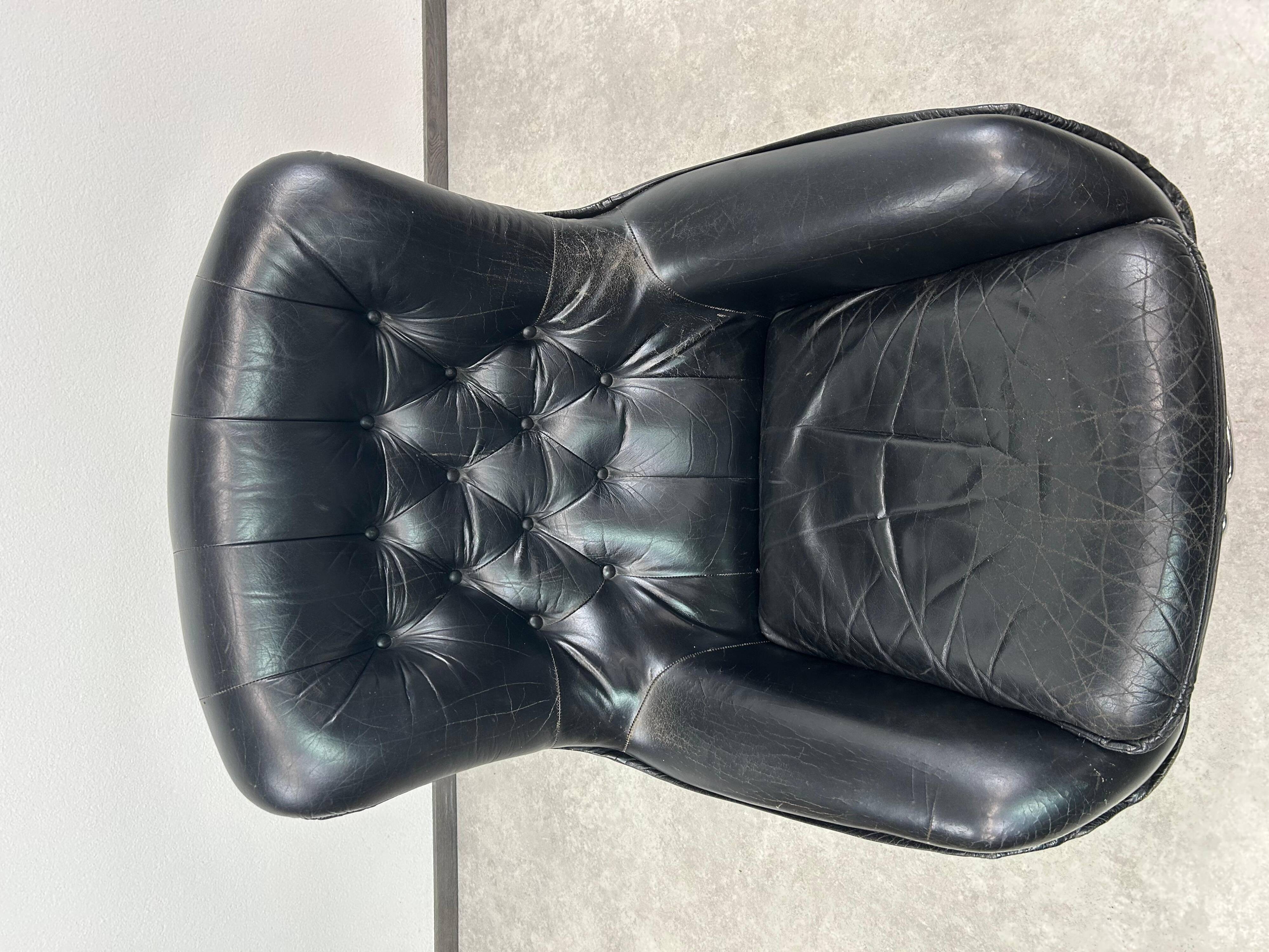 Black leather wingback swivel chair by PeeM