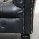 Black chesterfield daybed made of cowhide
