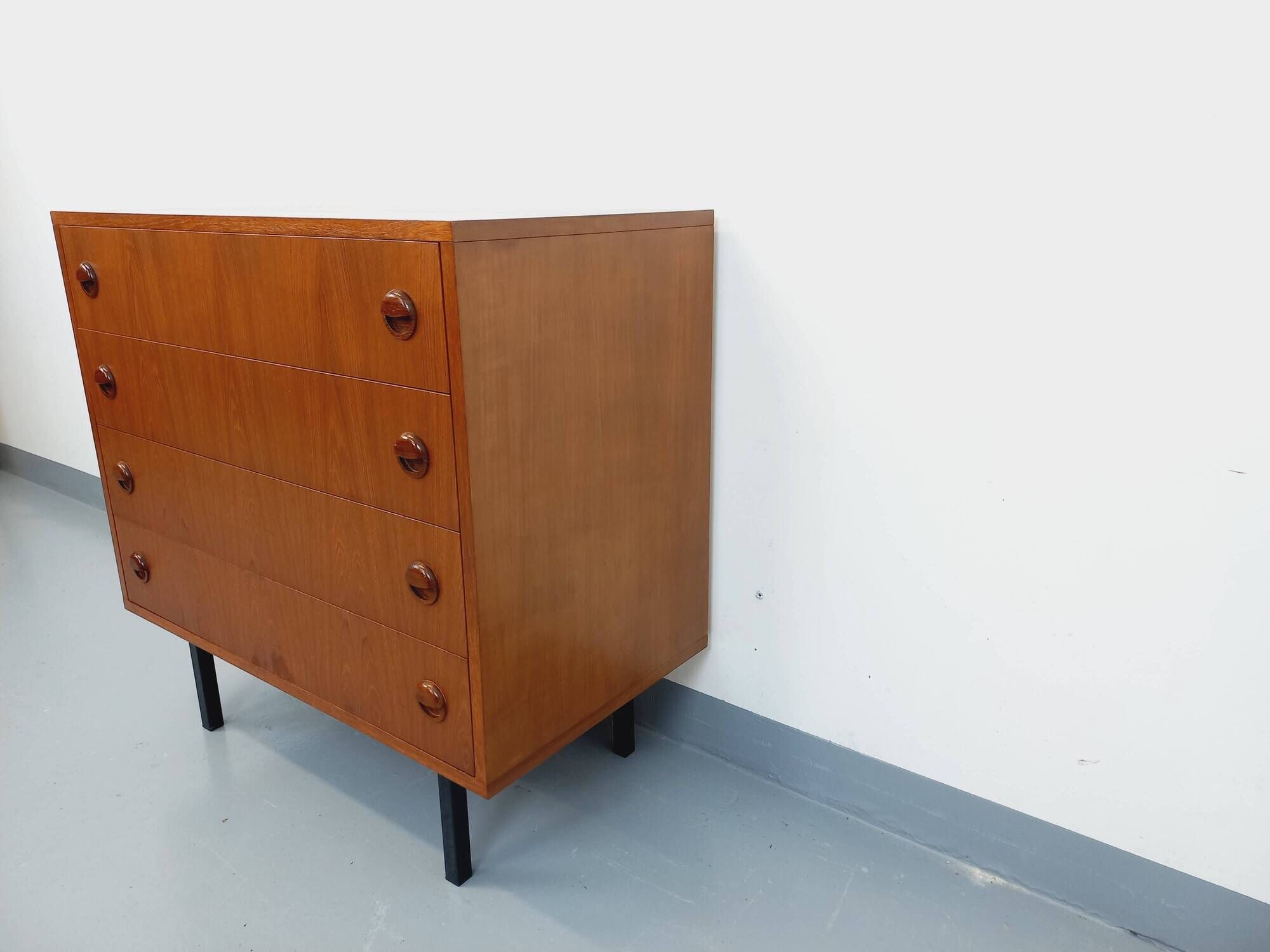 Vintage Scandinavian style chest of drawers in teak and black metal from the 60s