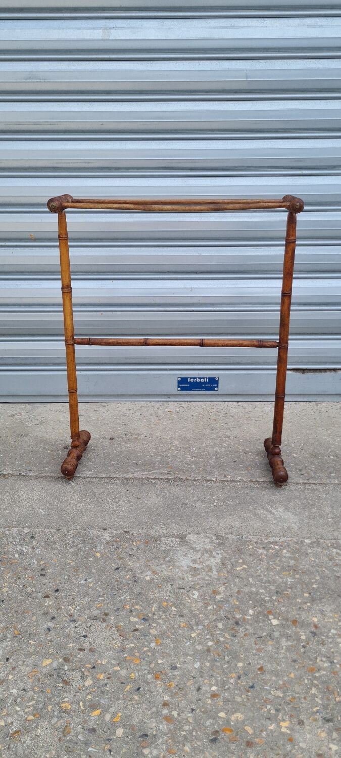 Turned wooden towel rack