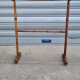 Turned wooden towel rack