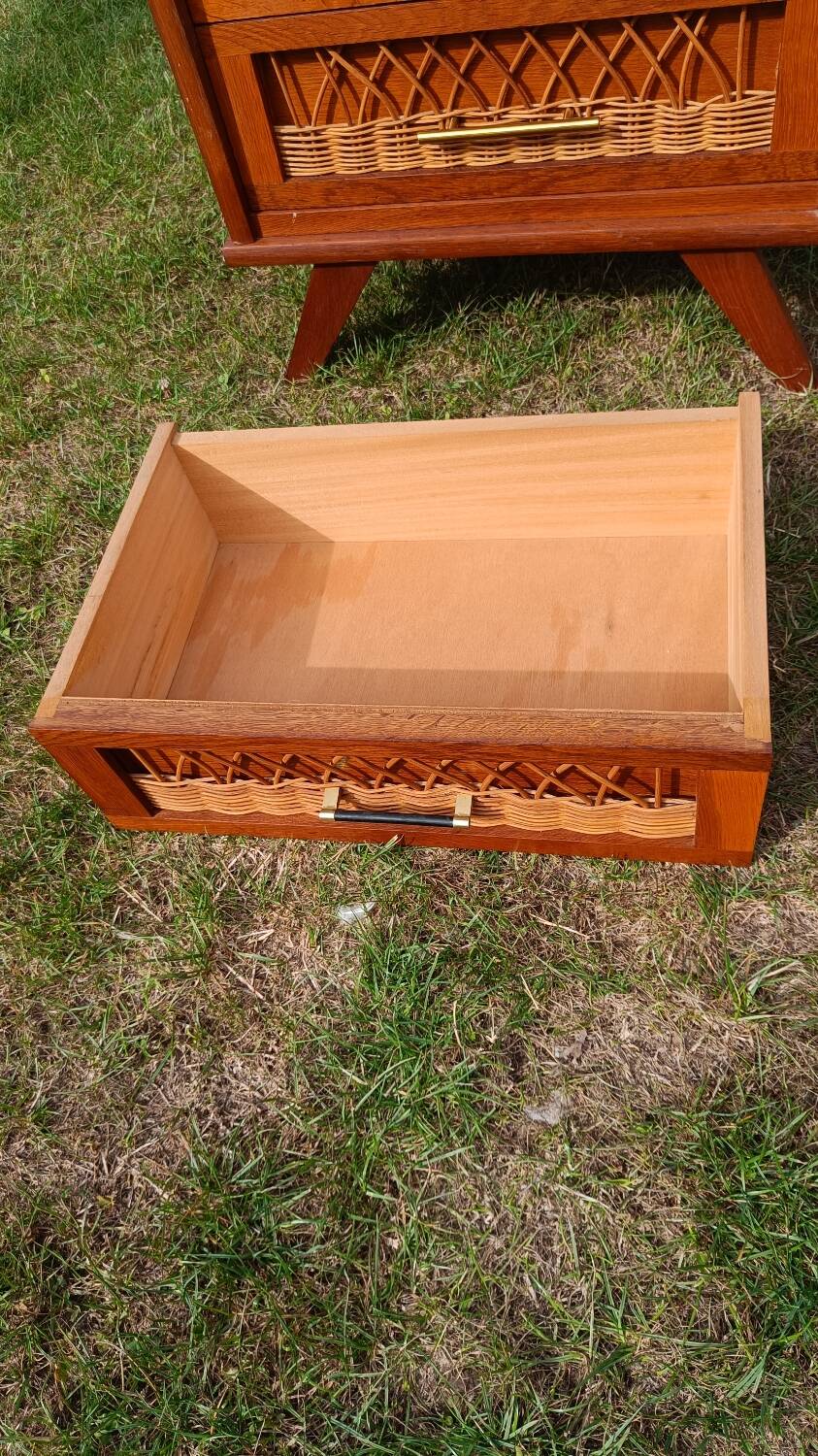 Tall chest of drawers in wood and rattan with splayed legs