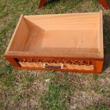 Tall chest of drawers in wood and rattan with splayed legs