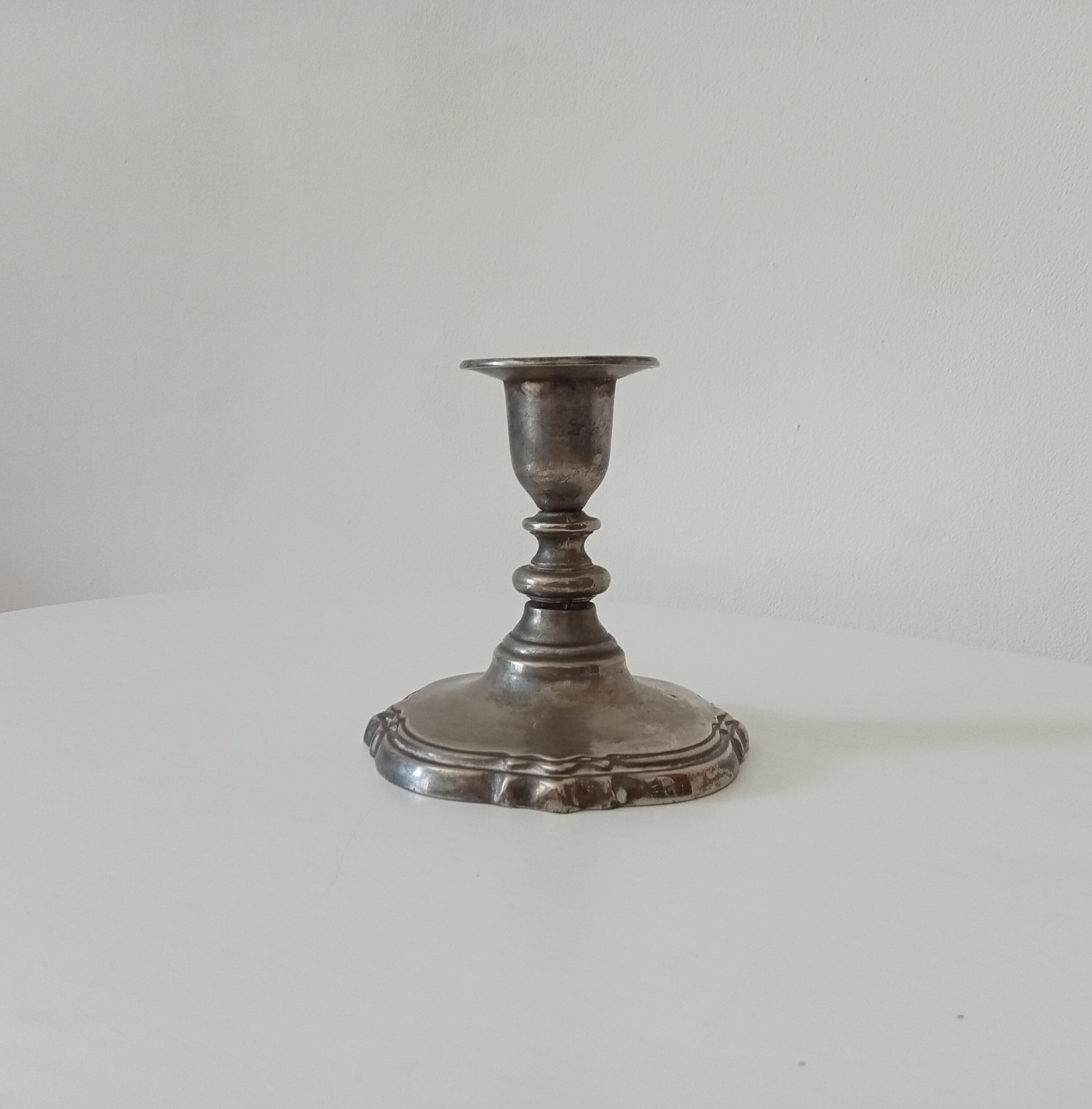 Vintage pewter candle holder