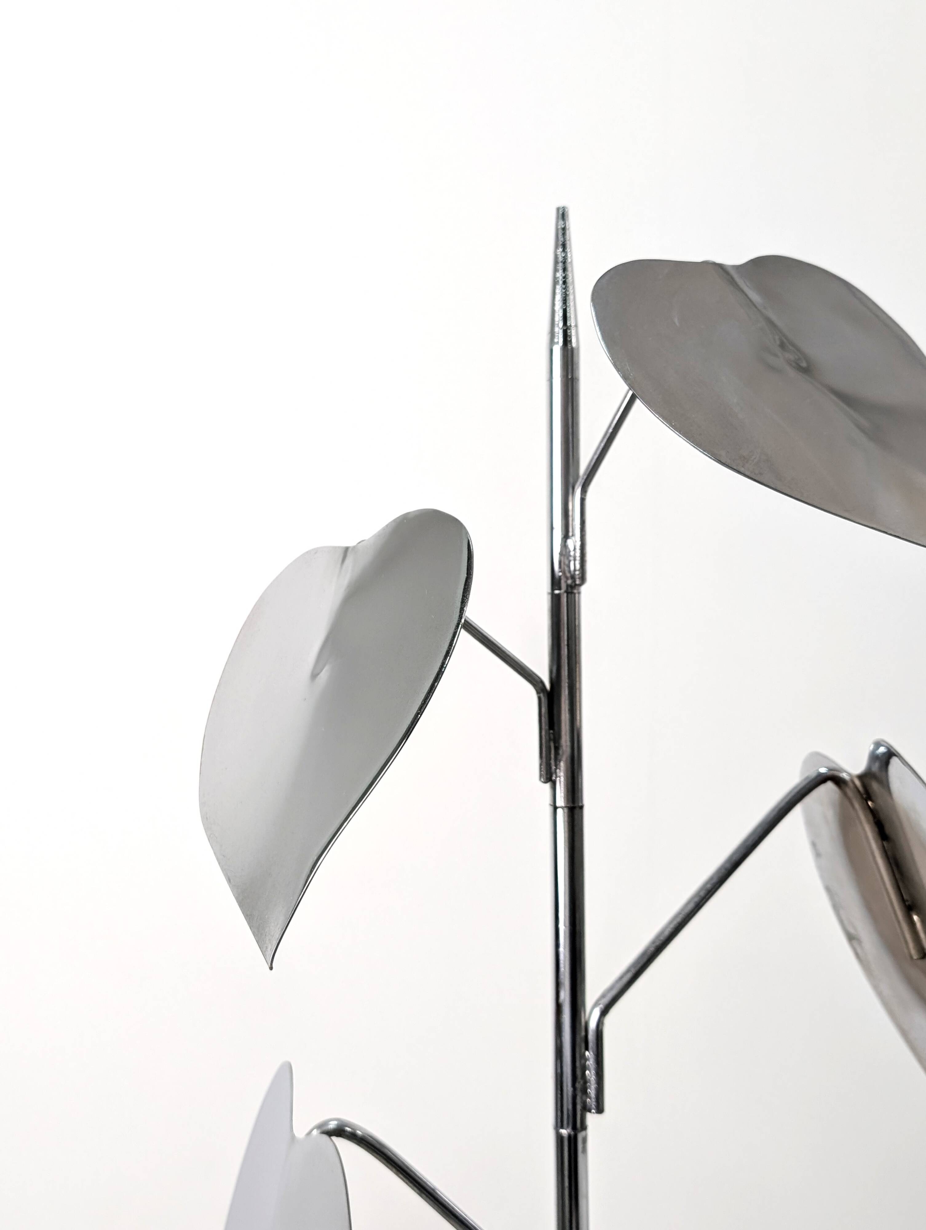 Standing sculpture with chrome leaves and circular base, 1970s