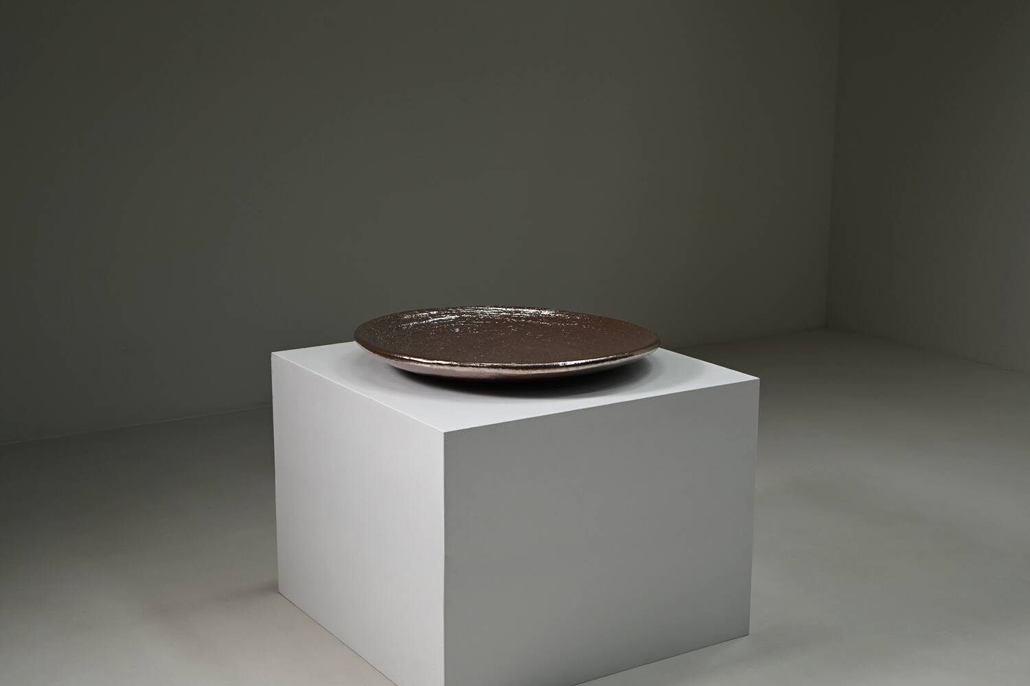 Large handmade metallic glazed ceramic bowl, circa 1980s–1990s.