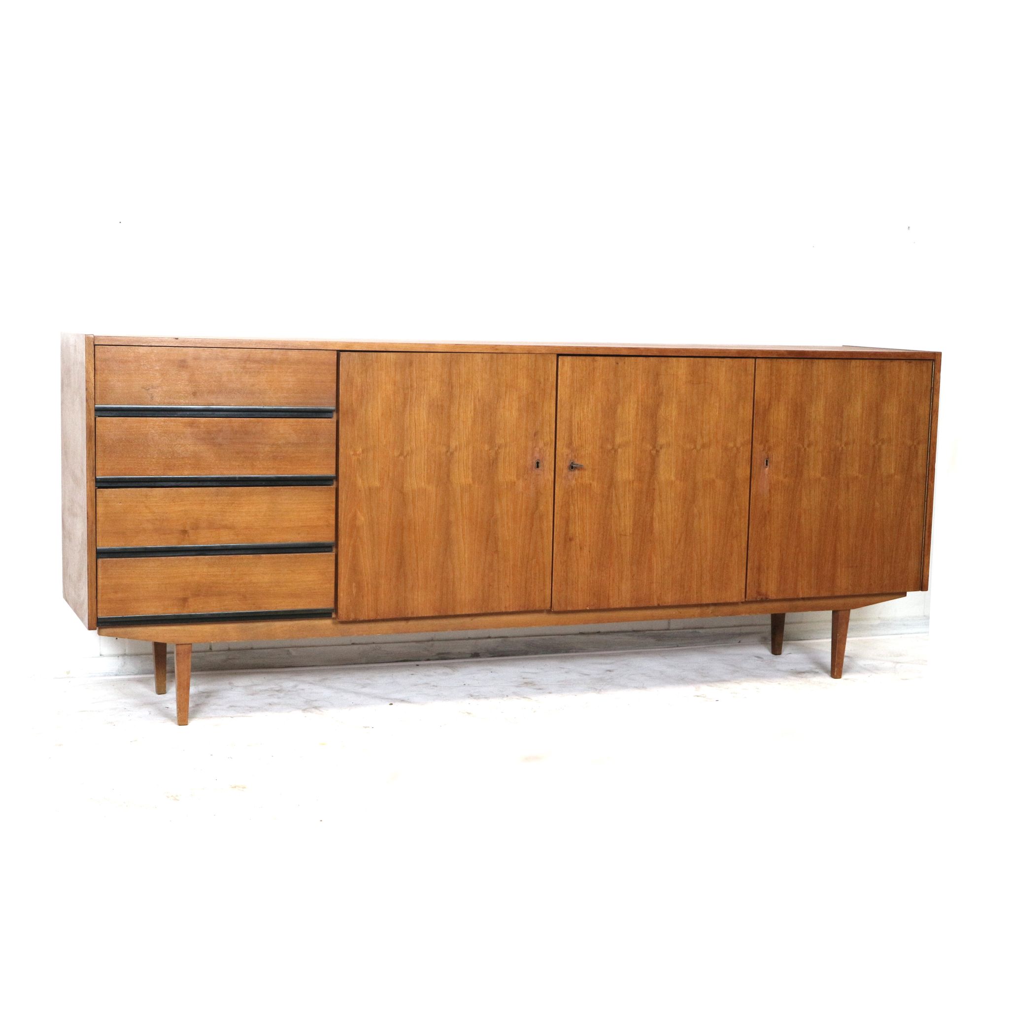 Large vintage sideboard with drawers and doors made in the 60s