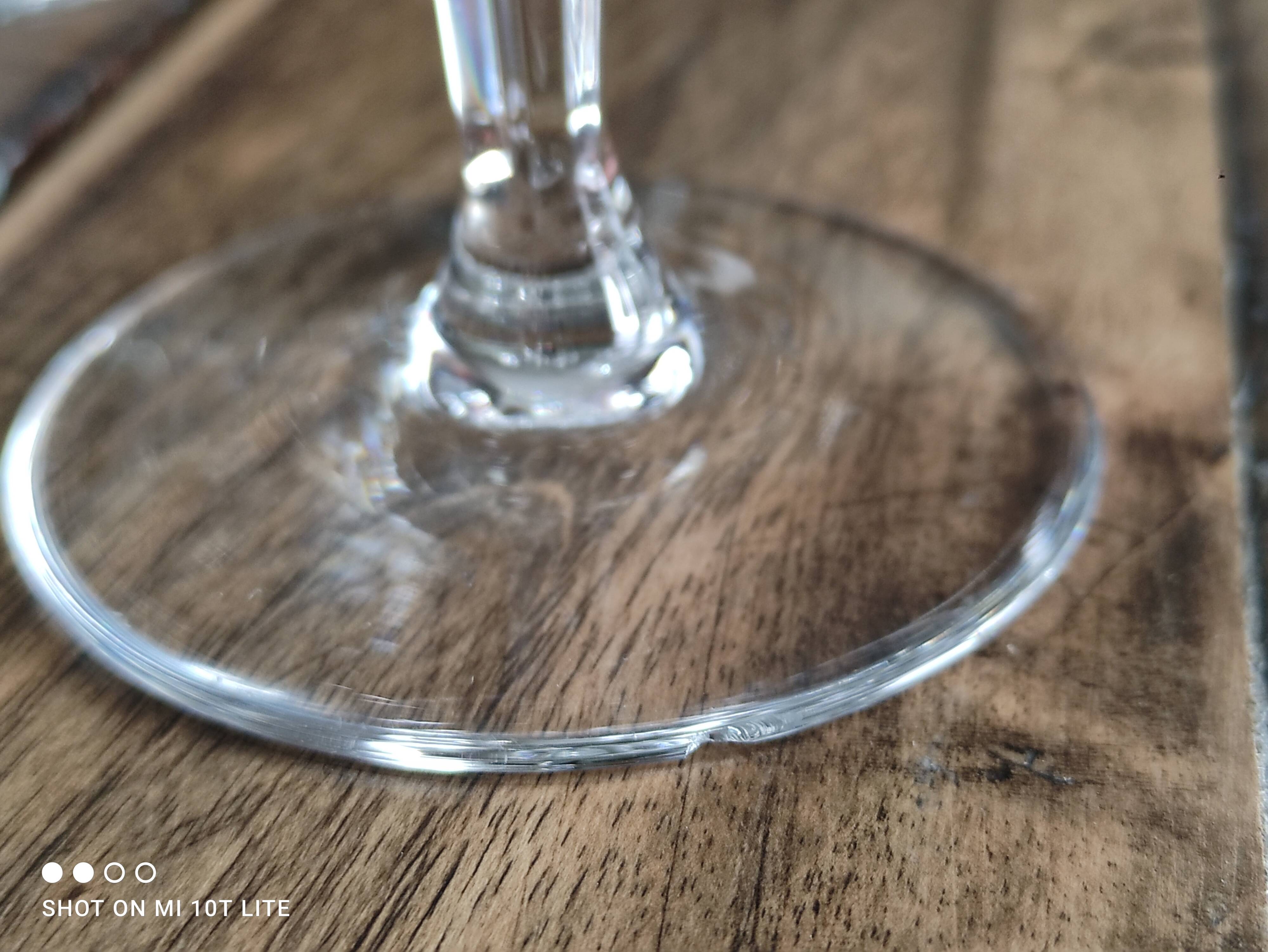 Set of 7 cut crystal wine glasses