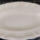 2 oval raviers Sarreguemines solid ivory color