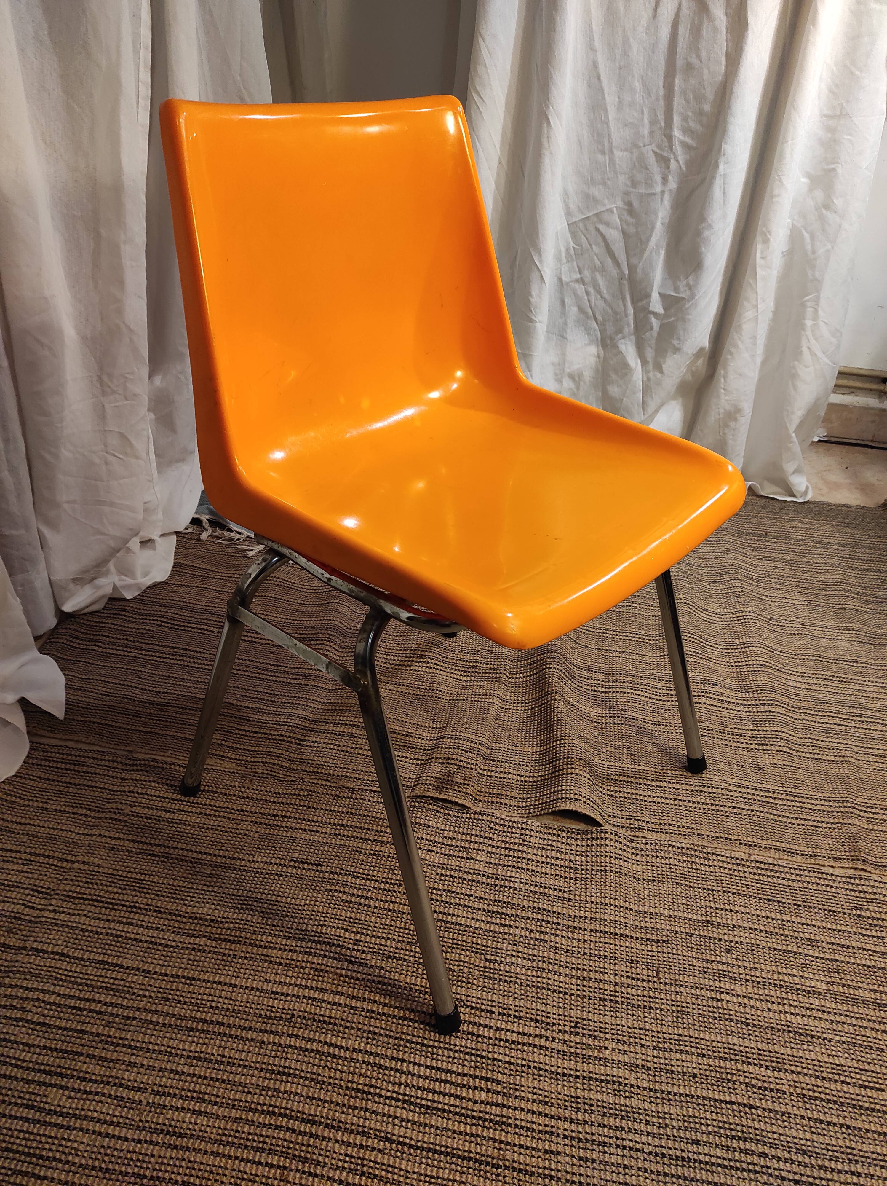 Orange plastic chair 1970