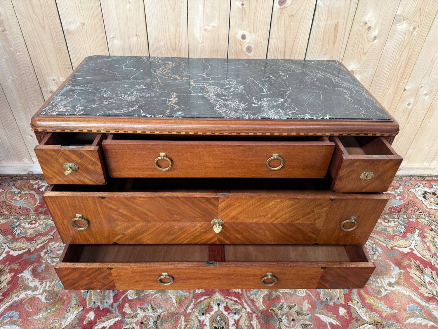 Art Deco walnut and black marble commode from the 1960s.