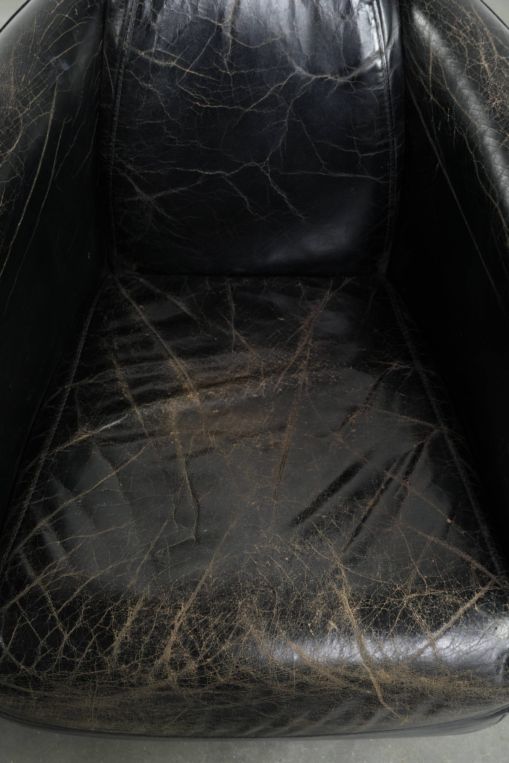 Set of two black vintage cowhide aviator design armchairs