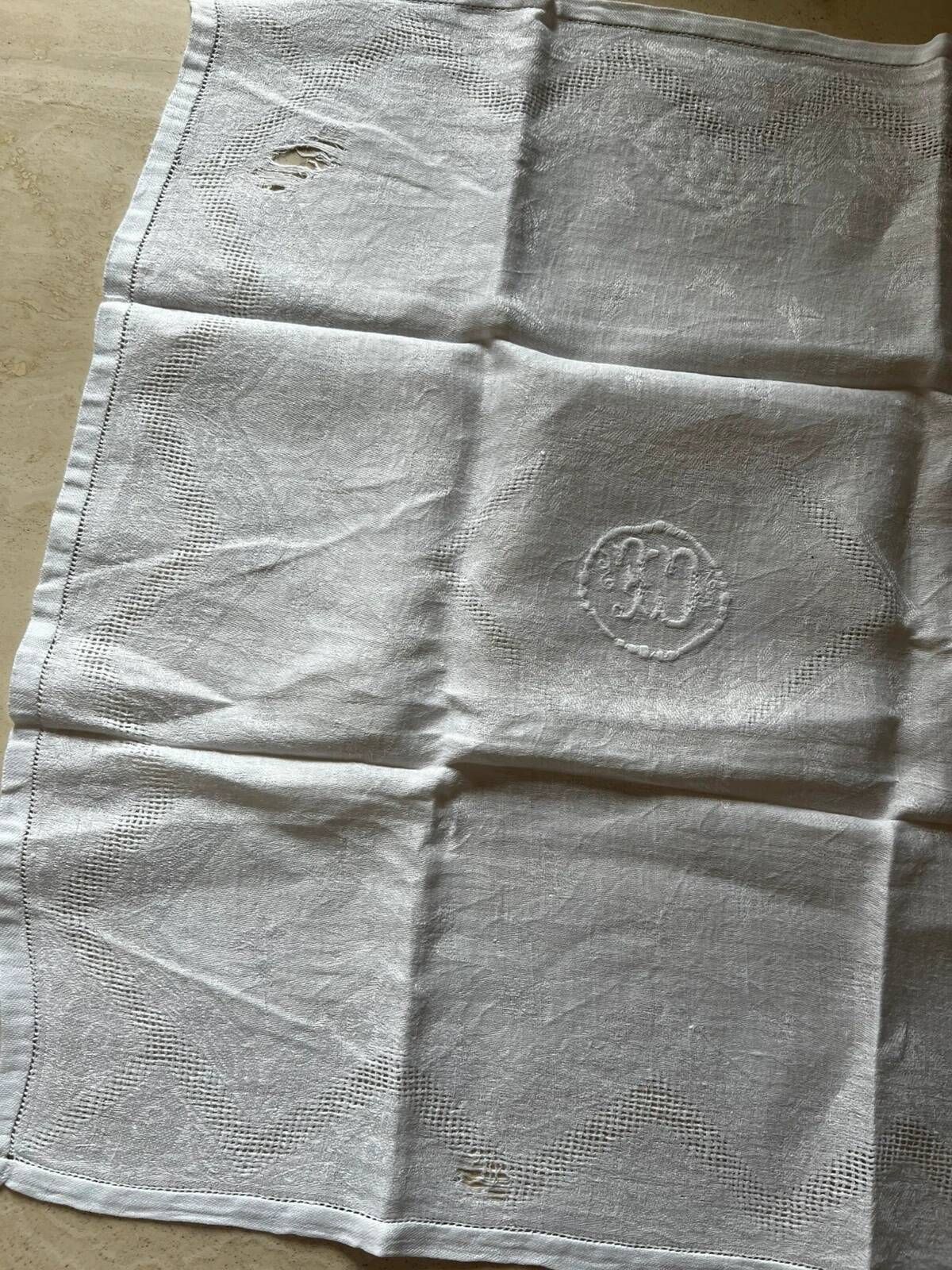 Set of six antique damask napkins with embroidered monogram.