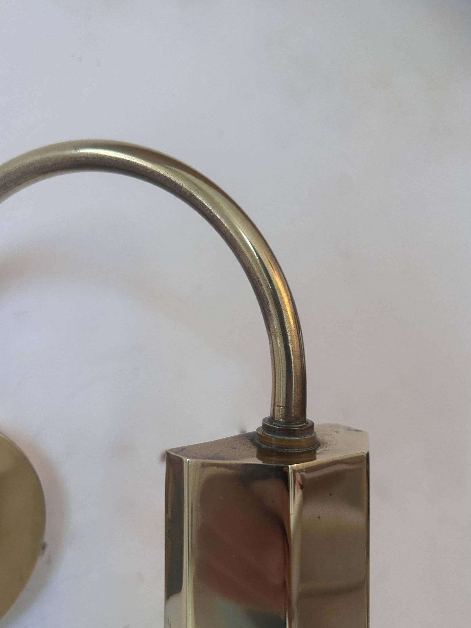 Pair of vintage adjustable wall lights, solid brass, France 1970