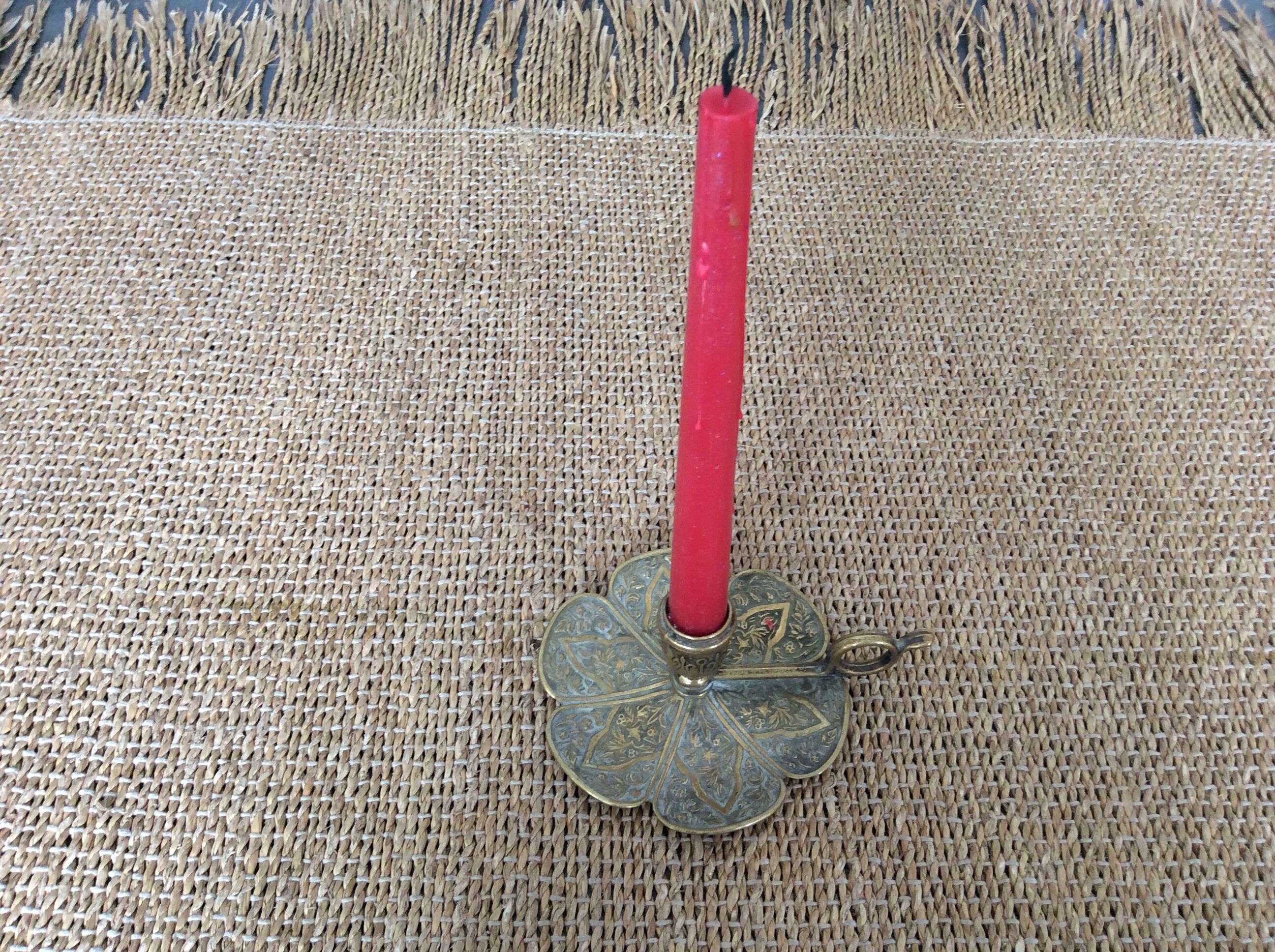 Cellar rat candle holder