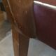 Skai chair binds wine and wooden footpieces and armrests