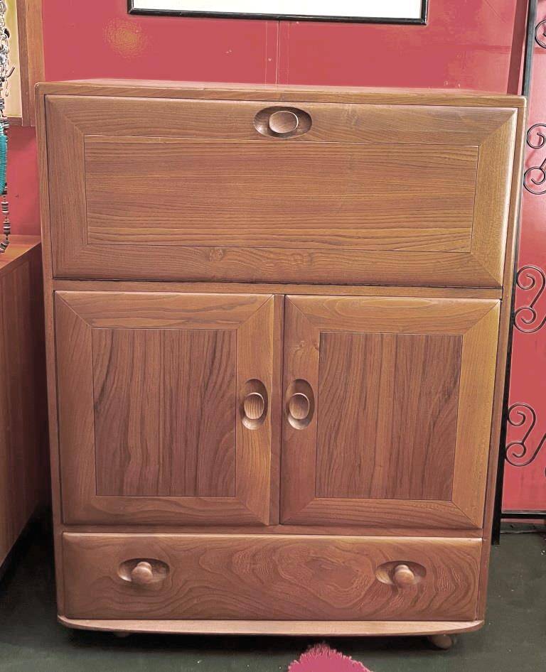Ercol English wooden secretary, on wheels – 1970s.