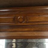 Antique wardrobe with a mirror door.