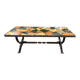Vintage stone coffee table with a cast iron frame.