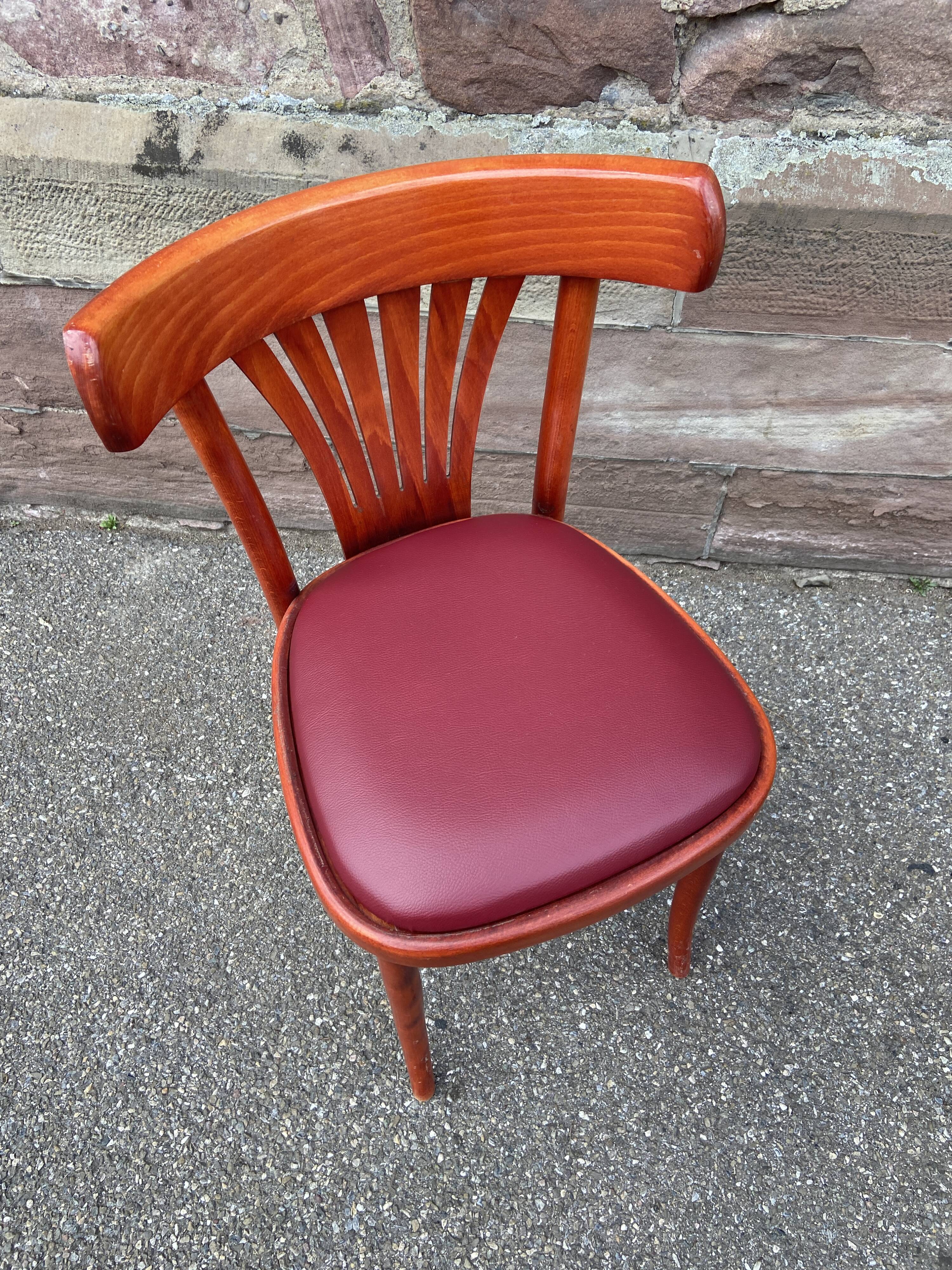 Pair of Alsatian bistro chairs in wood and leather, 1960