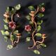 Pair of painted sheet metal flower sconces, Italian, 1960