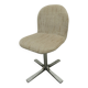 Swivel chair in chrome and clean, sturdy patterned fabric from the 1970s.