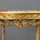 Table style néoclassique en bois sculpté XIXe siècle