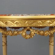 Antique neoclassical centre table in carved wood from the 19th century.