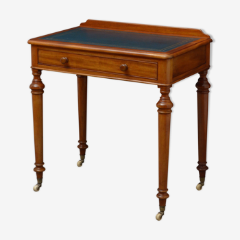 Victorian mahogany writing table of narrow proportions