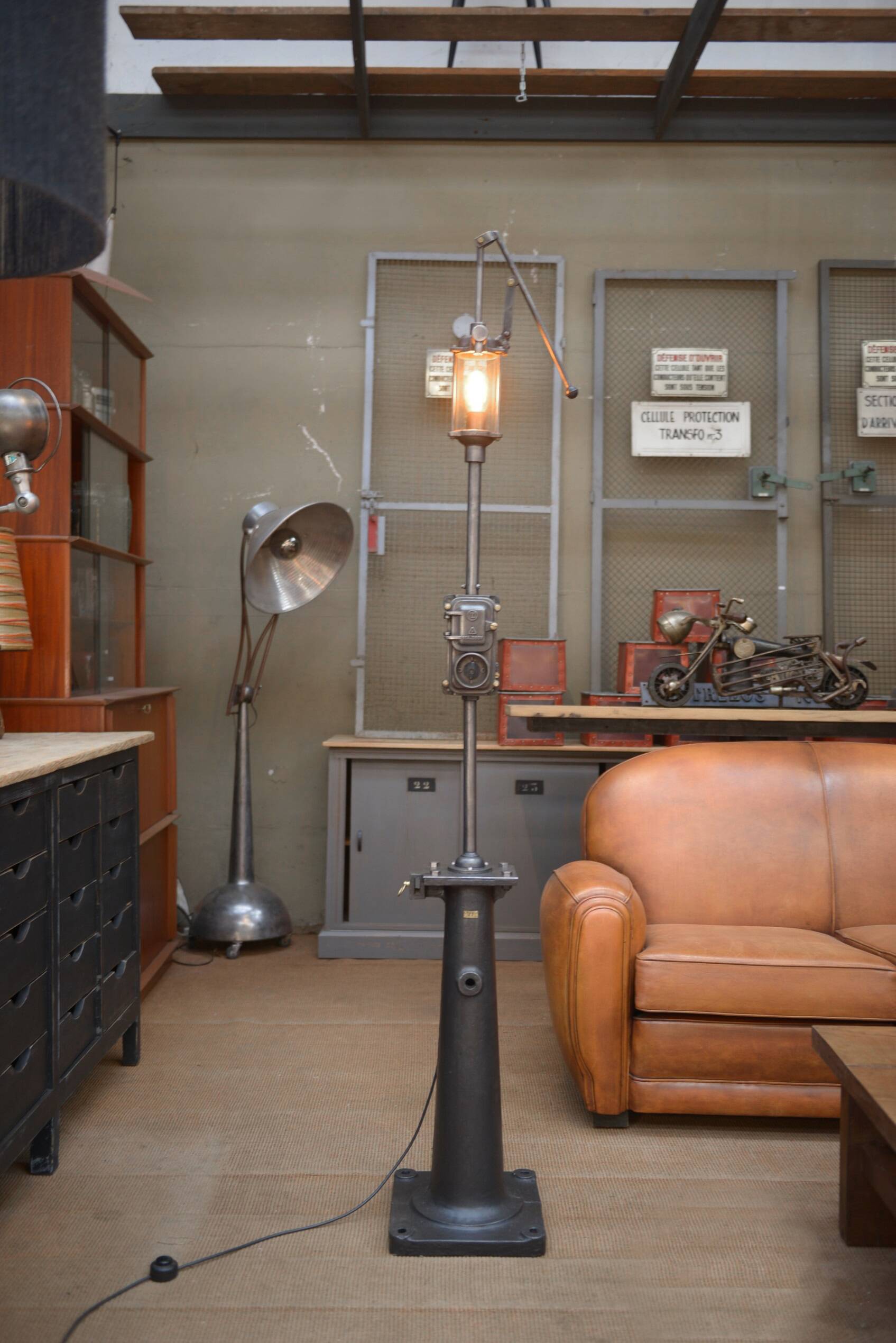 Old gas pump floor lamp in cast iron metal and glass 1930