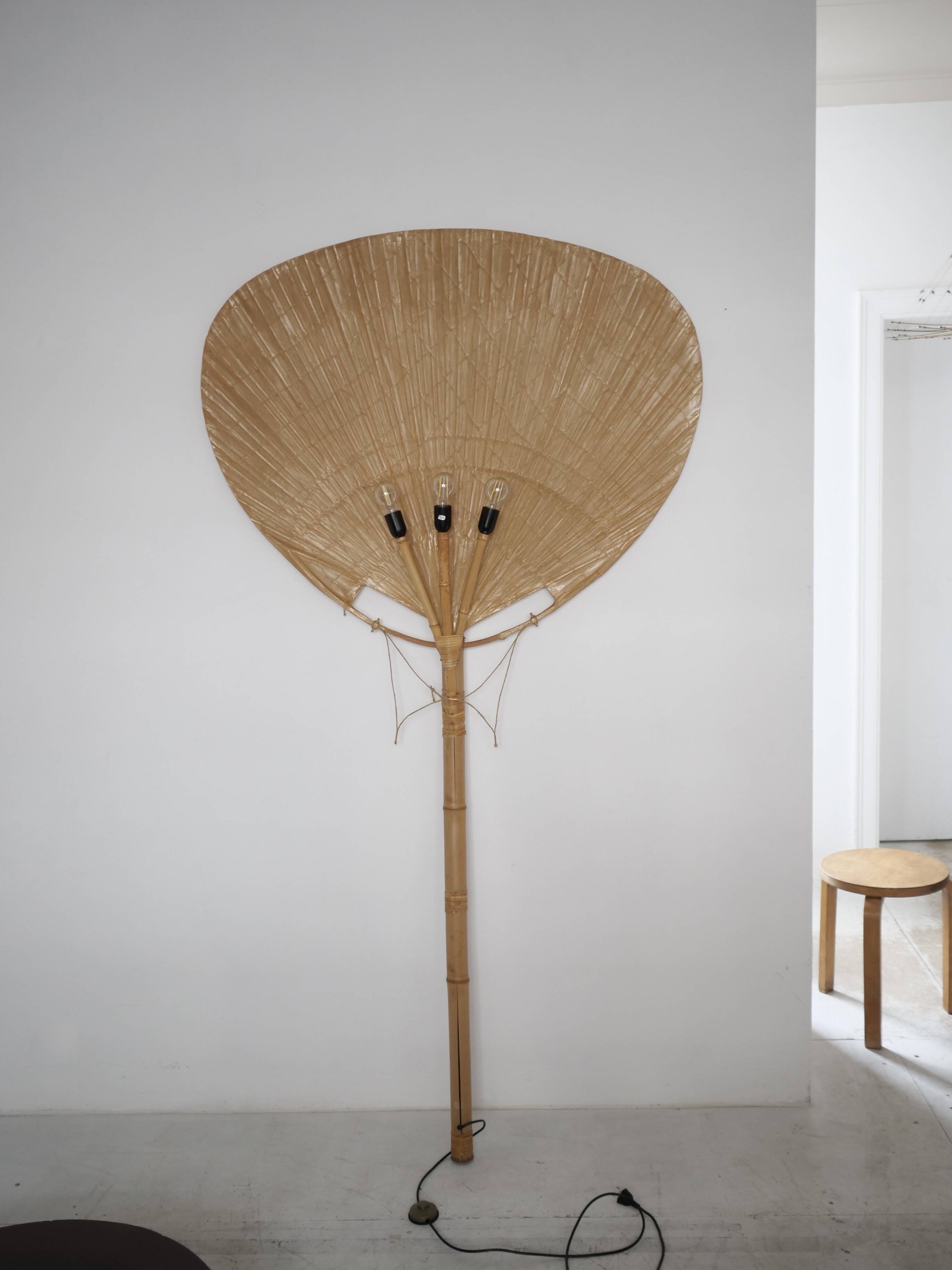 Large-format Uchiwa light fixture designed by Ingo Maurer