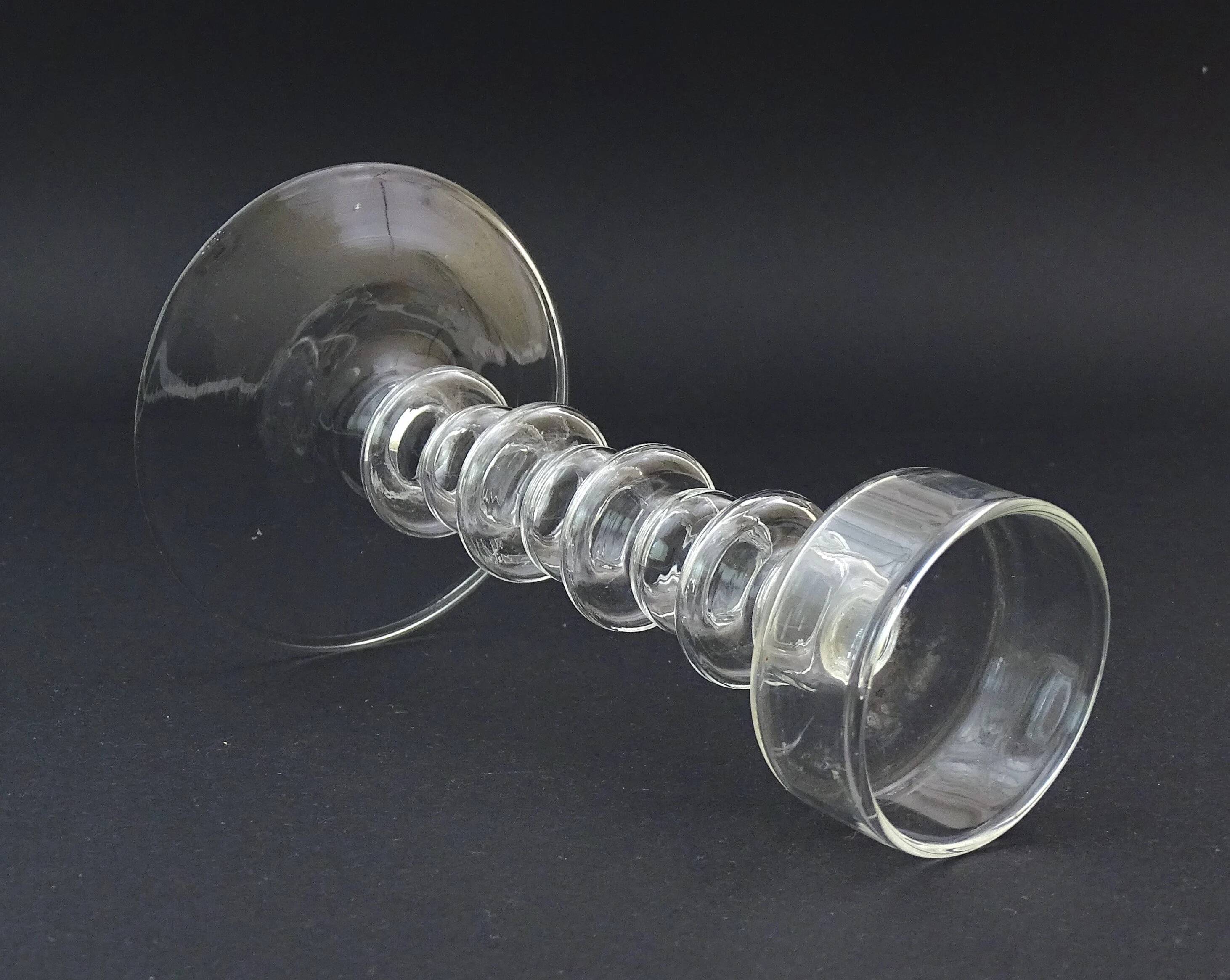 Vintage candlestick in mouth-blown clear glass