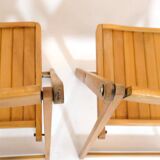 Pair of wooden folding chairs from the 80s.