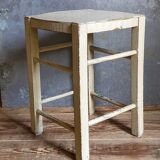 Old patinated painted wooden stool