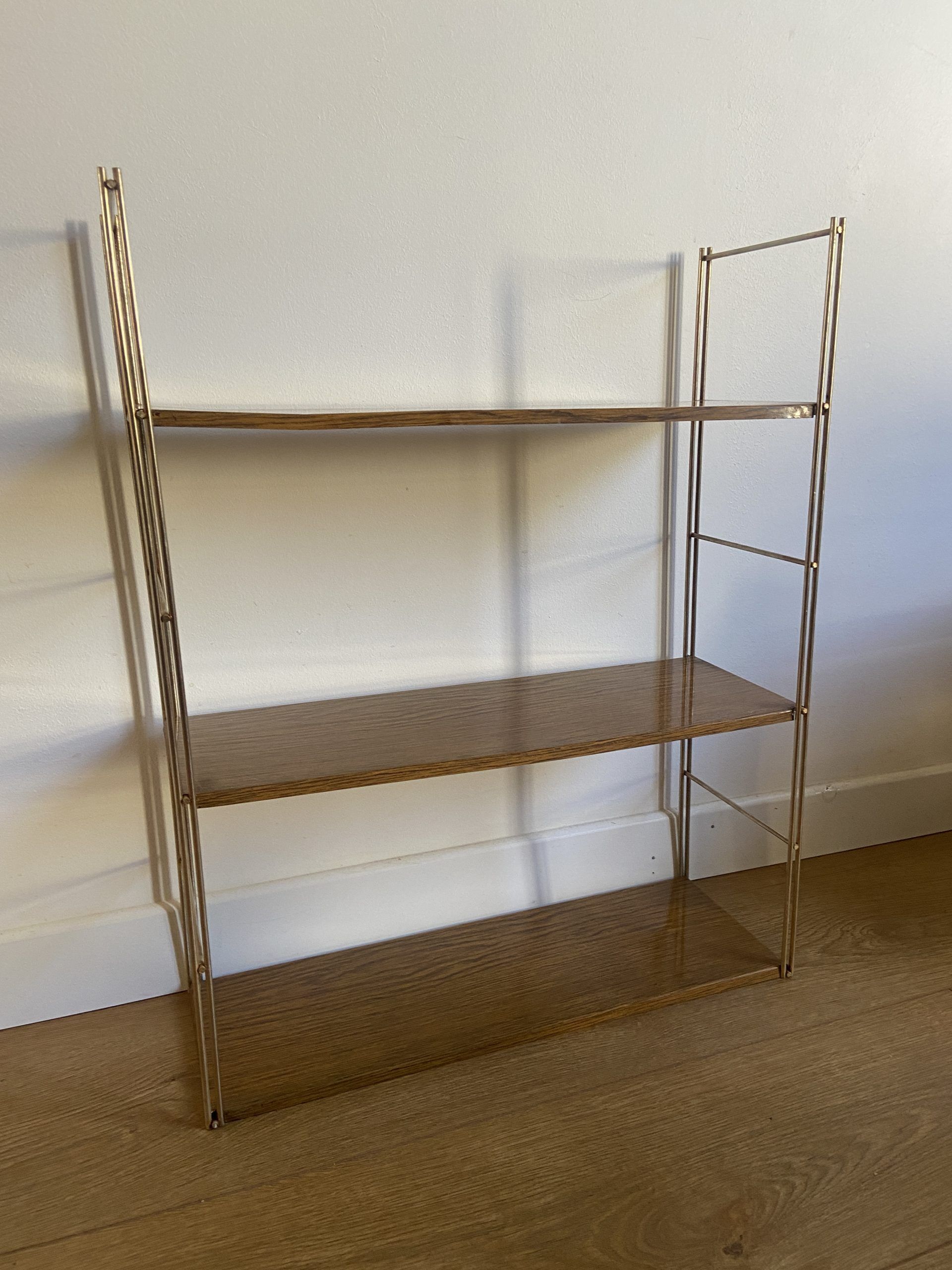 Self vintage metal wall shelf imitation wood in string or tomado style