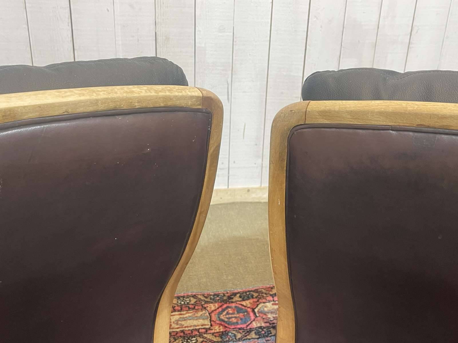 Pair of leather and beech armchairs from the 1970s.