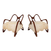 Paire de fauteuils sculpturaux en bois, Italie