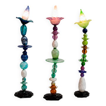 Set of three sculptural multicoloured glass floor lamps in a modernist style.