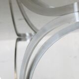 Living room table "Space Age" polished steel, circular slab smoked glass. France, circa 1970.